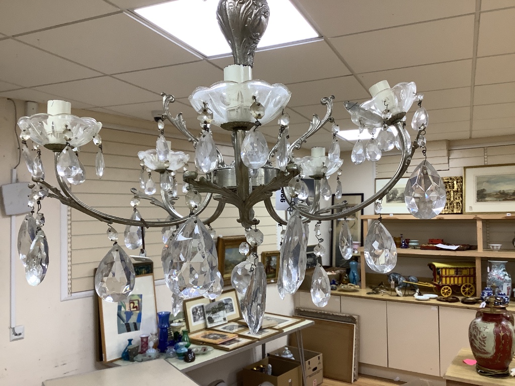 A plated and glass drop chandelier